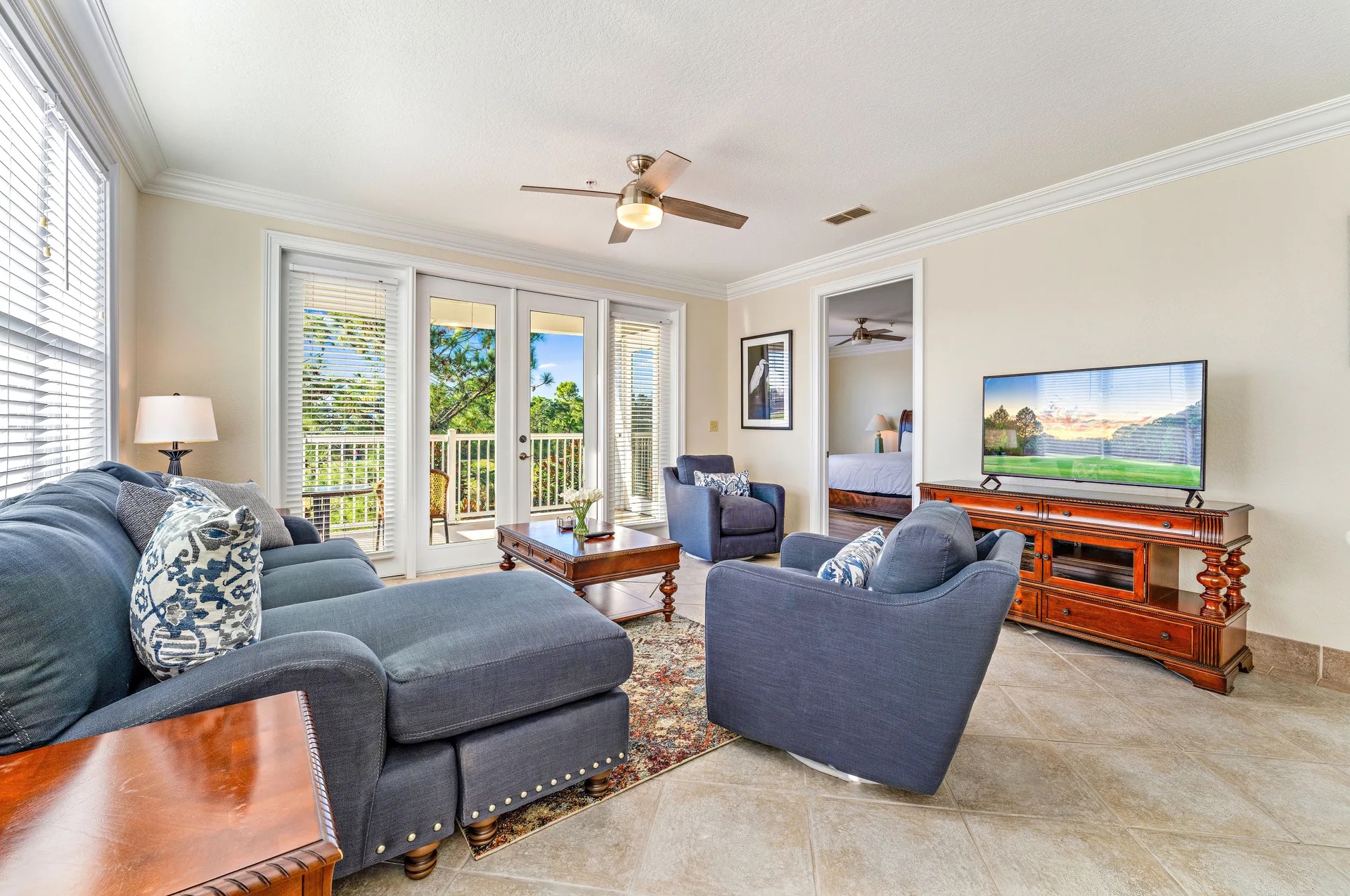 Residence Condominium living room with sofas and balcony doors in Carrabelle FL