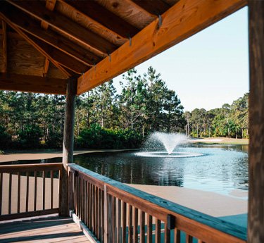 The Fountain Room indoor banquet venue with pond and fountain views at St. James Bay